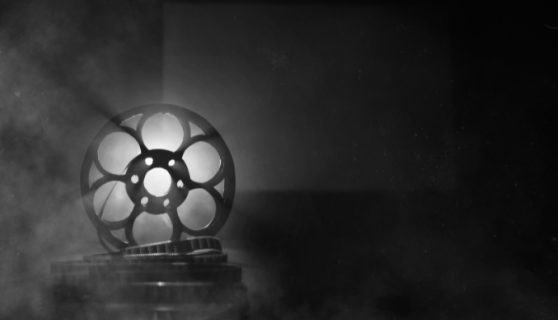 Black and white image of a film projector
