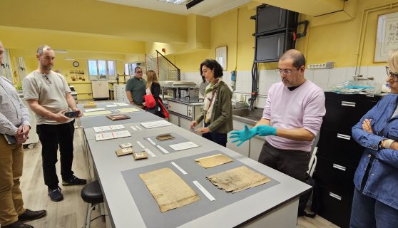 SAGA project partners observing archival conservation work at the National Archives of Spain in Madrid, including Shane Cronin (MTU TEL) and Colman McCarthy (MTU CTC).