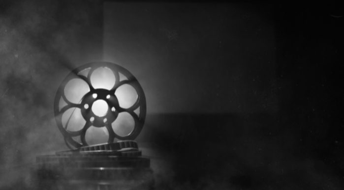 Black and white image of a film projector